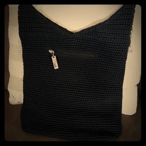 The Sak black woven messenger style bag